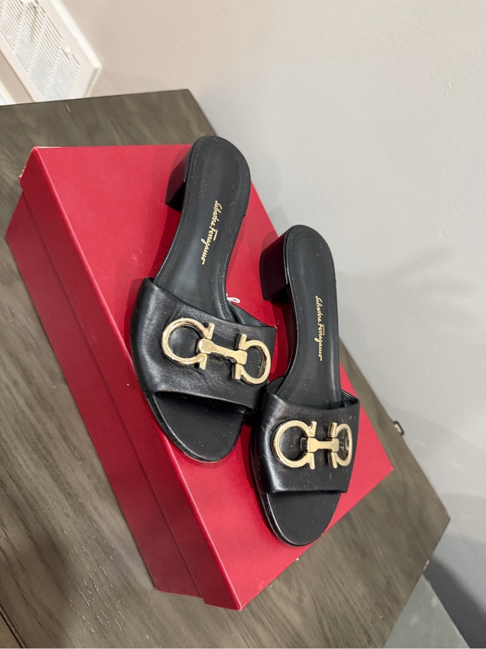 Salvatore Ferragamo Black Leather Slides with Gold Gancini